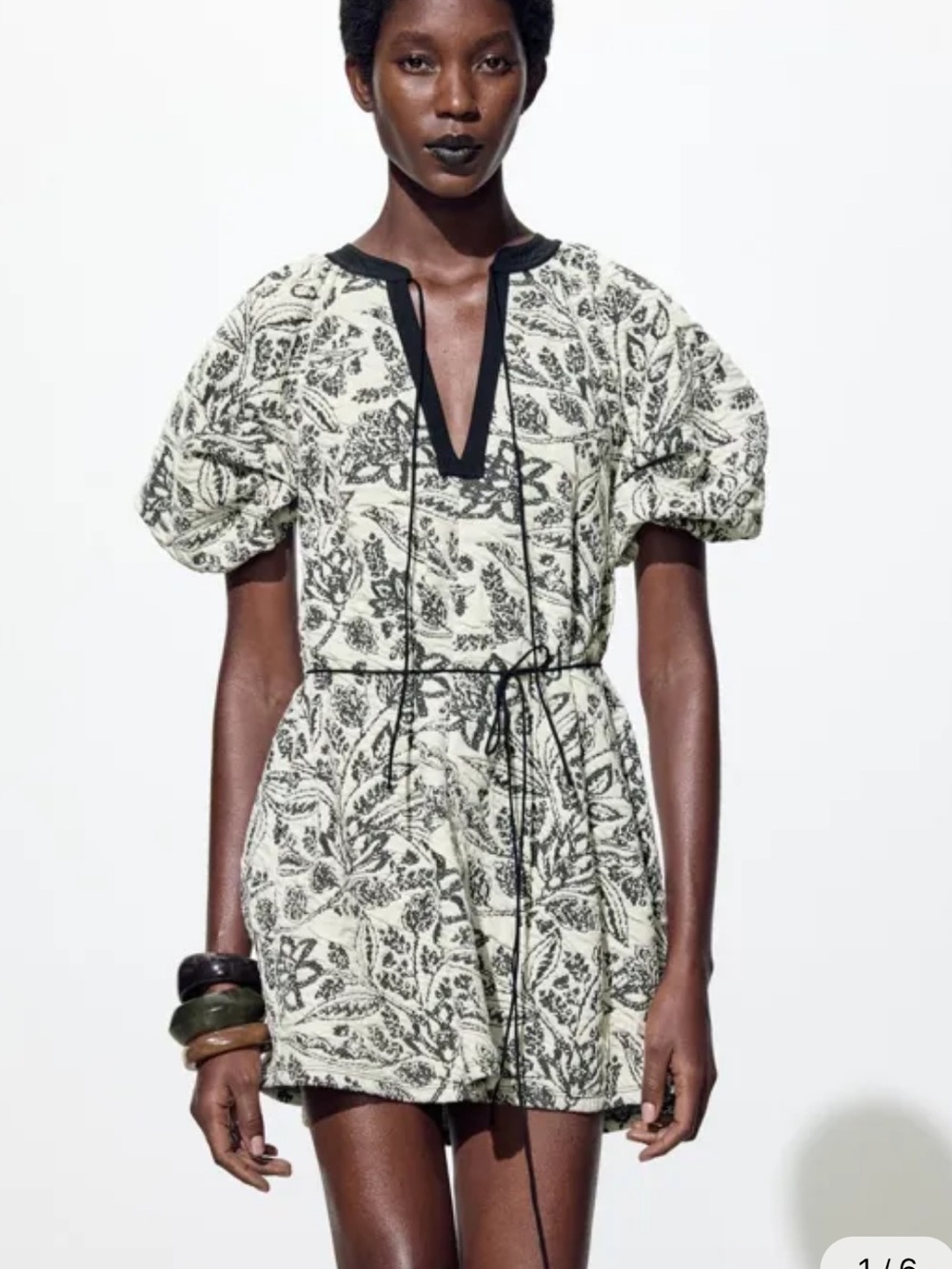 Zara patterned puff-sleeve mini dress with a contrasting black neckline.